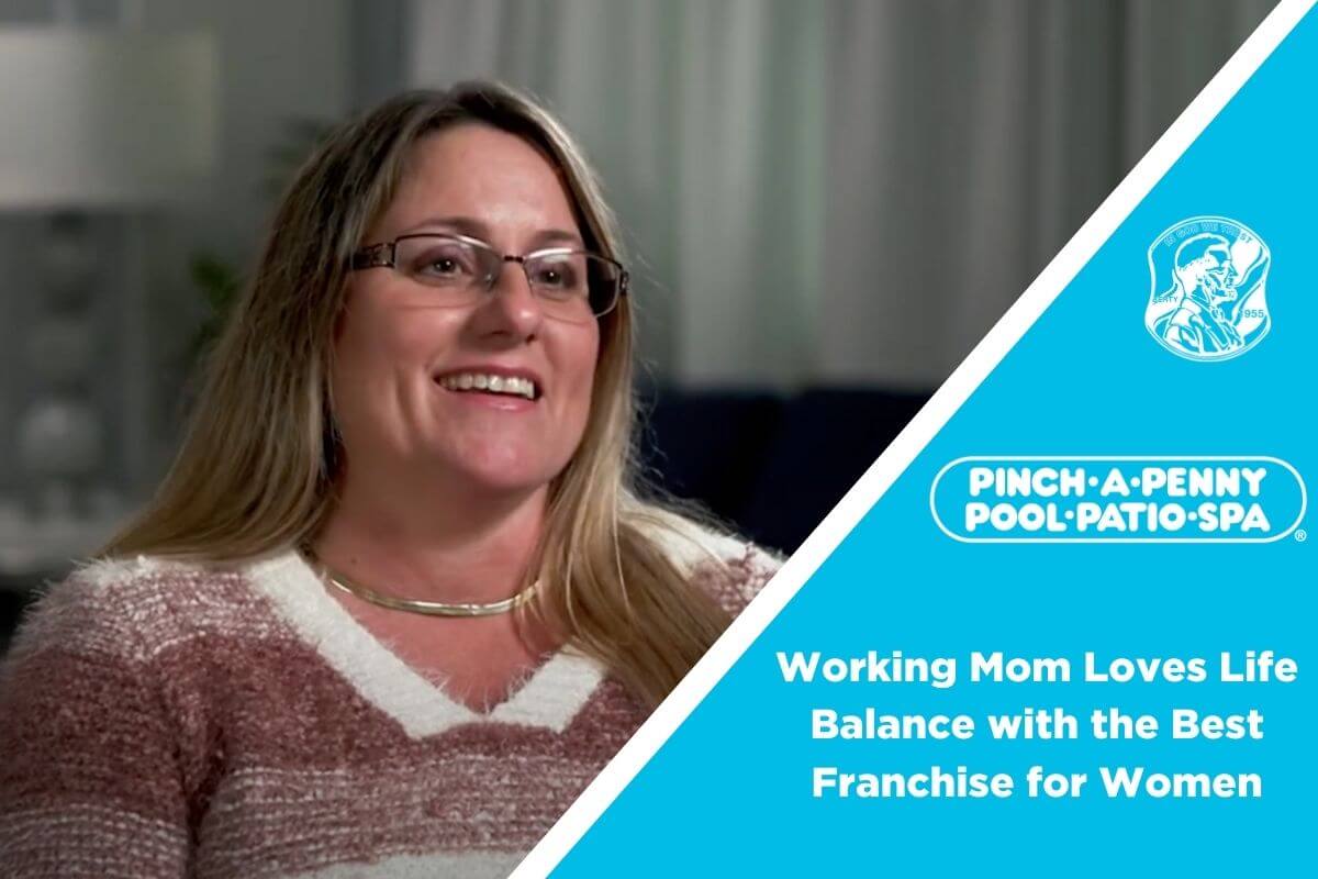 Woman in sweater smiling at the camera