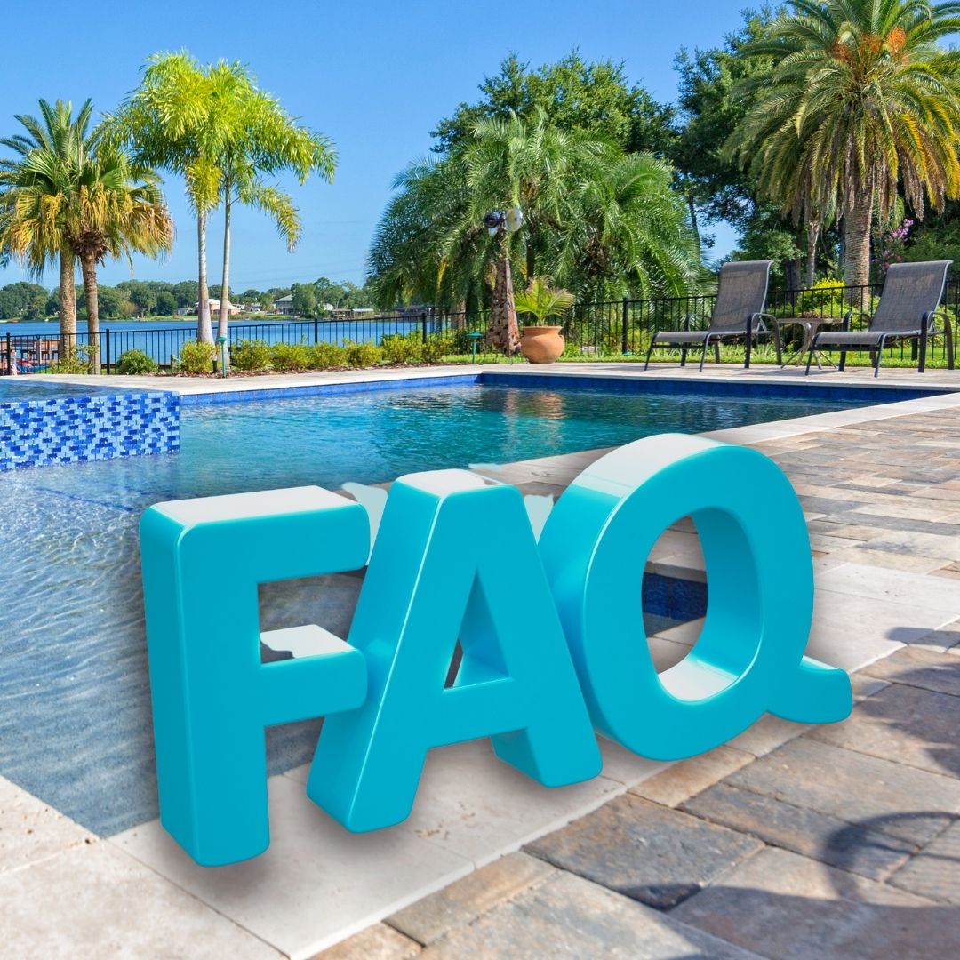 Outdoor pool scene with large 3D turquoise letters spelling “FAQ” on the pool deck, with palm trees in the background.