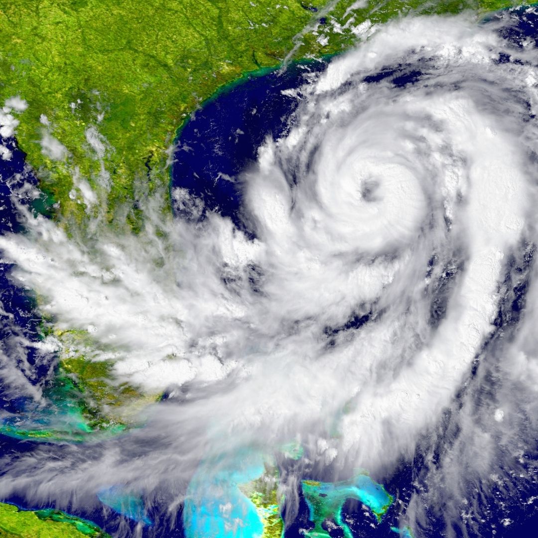 Satellite image of a large hurricane swirling over the Gulf of Mexico approaching the southeastern United States.